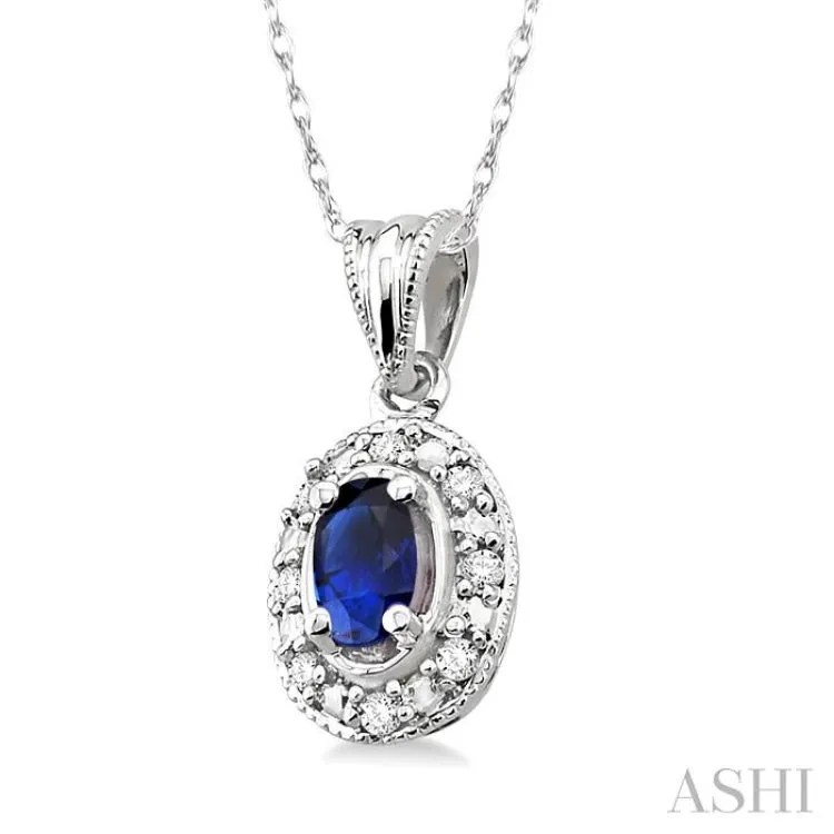 5x3mm Oval Shape Sapphire and 1/20 Ctw Single Cut Diamond Pendant in 10K White Gold with Chain.