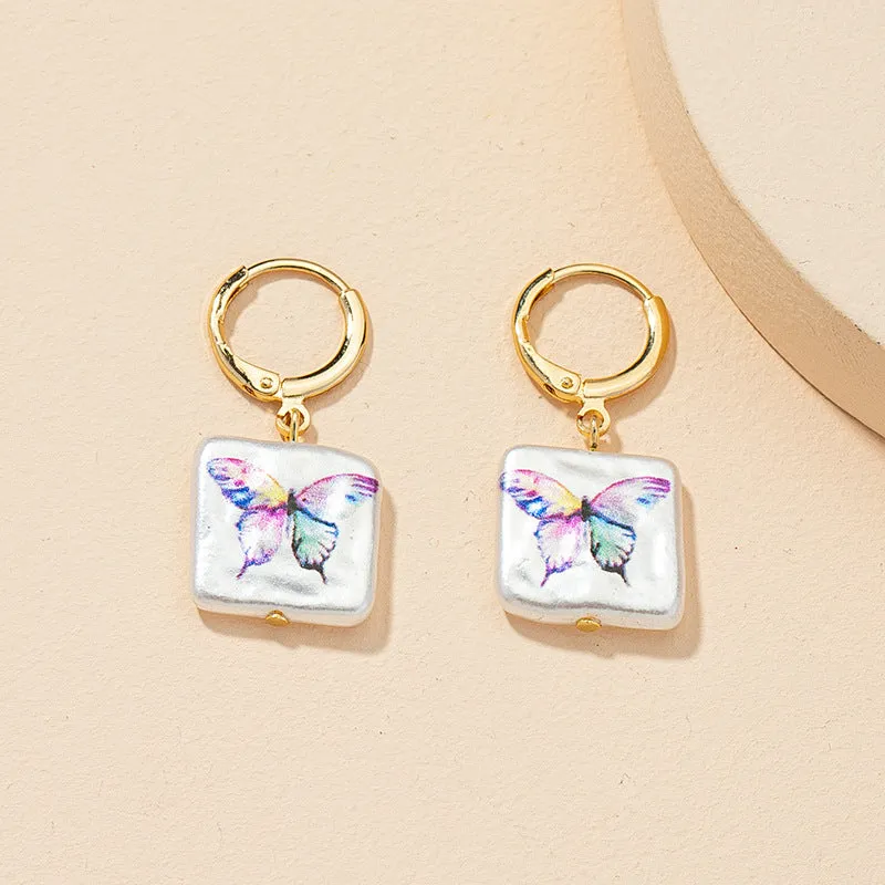 Butterfly Pearl Earrings - Retro Chic Wholesale Jewelry
