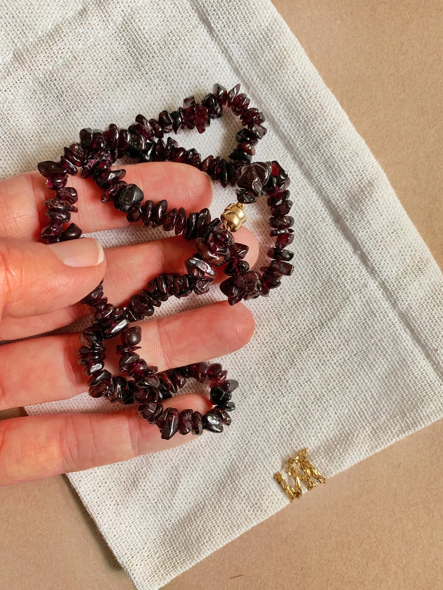 The Surfer Boy Necklace (Garnet)